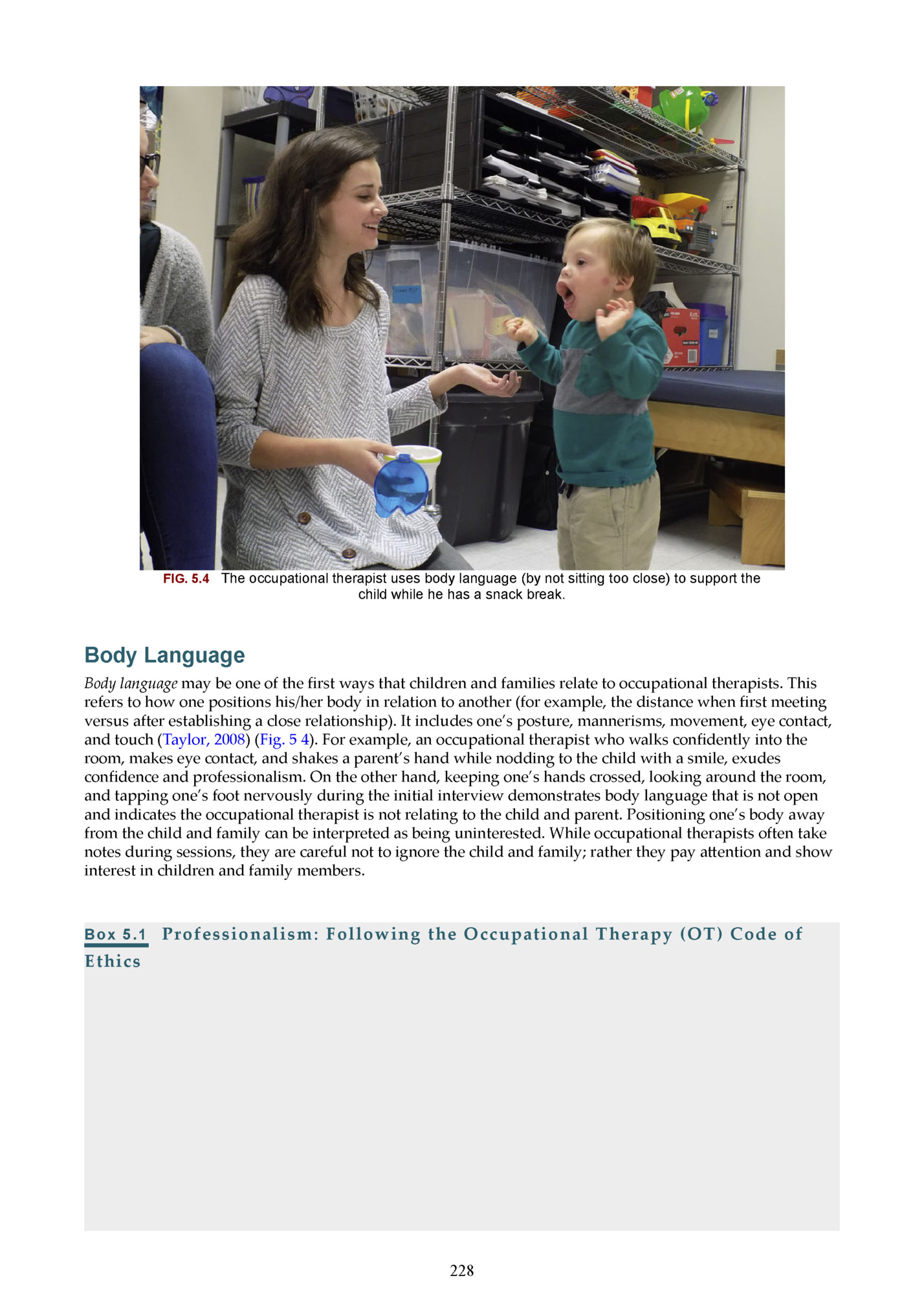 FIG. 5.4 The occupational therapist uses body language (by not sitting too close) to support the